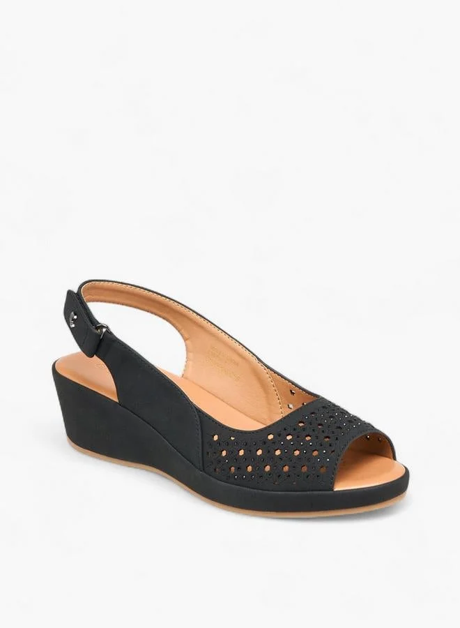 لو كونفورت صنادل بكعب إسفين بتفاصيل مقصوصة للنساء