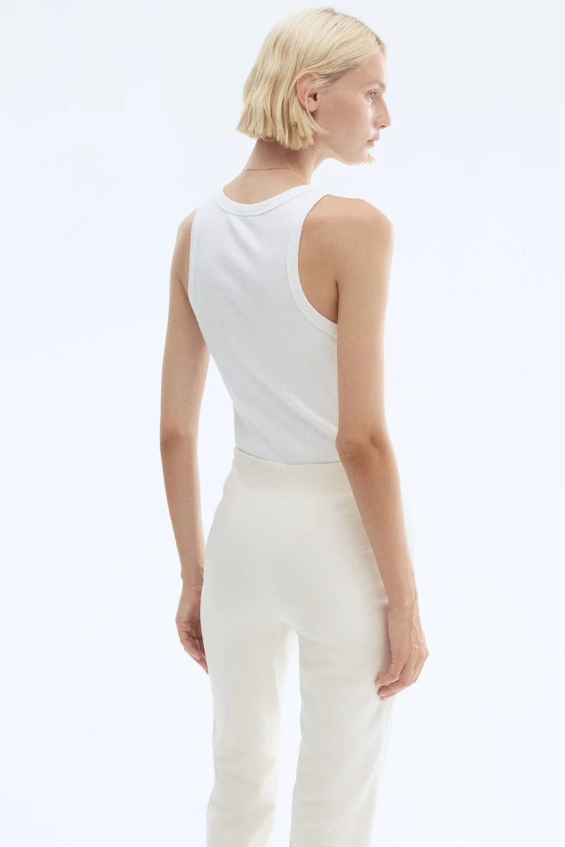H&M Flared crease-front trousers