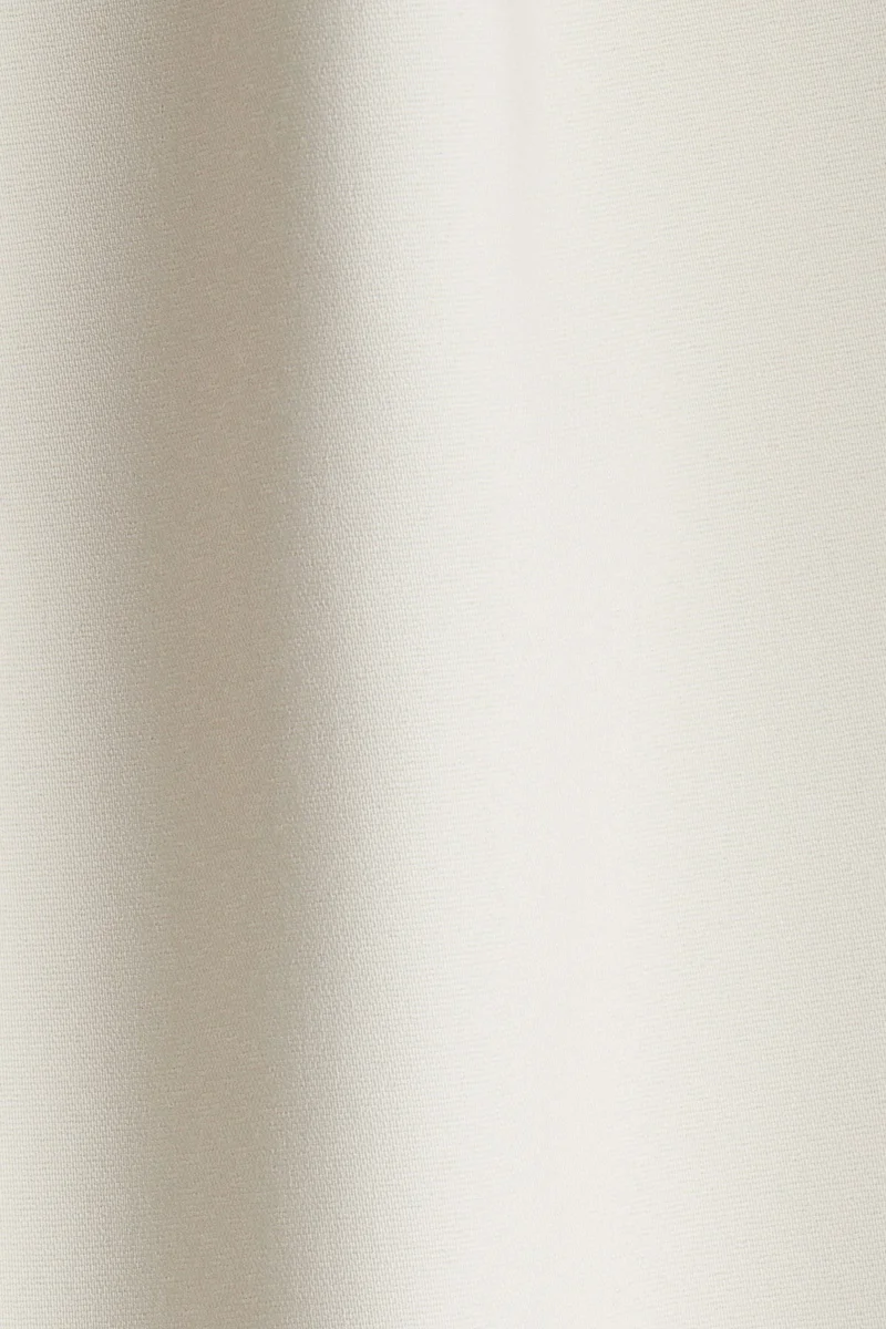 H&M Flared crease-front trousers