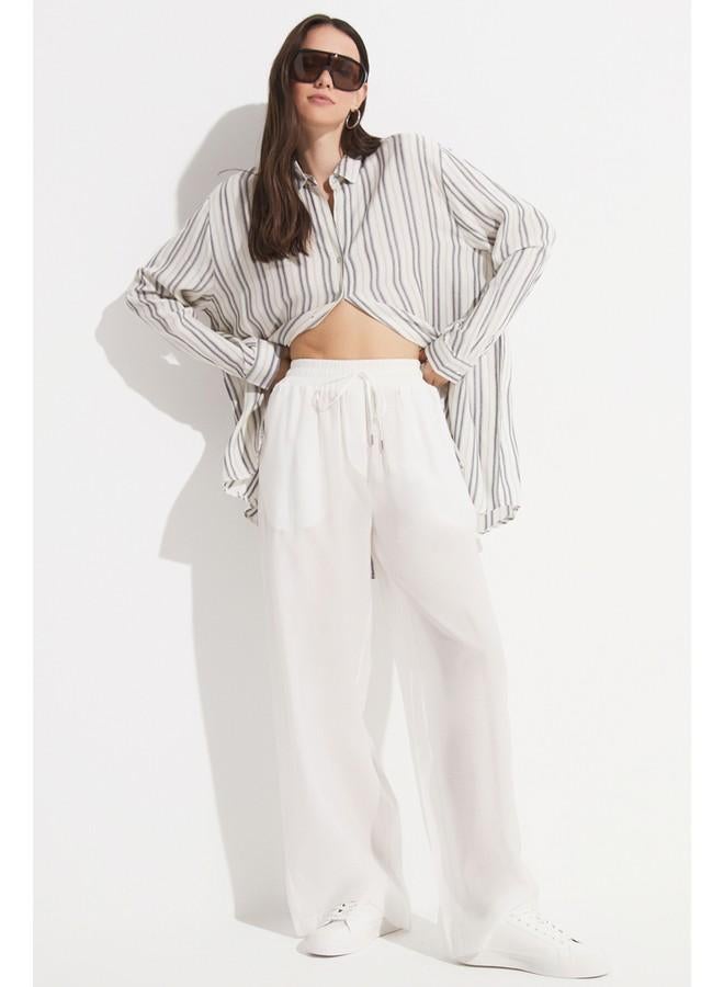 جون بنطلون واسع نسائي من مودال بمقاس مرن بخصر مطاطي بلون إكرو - Image 4