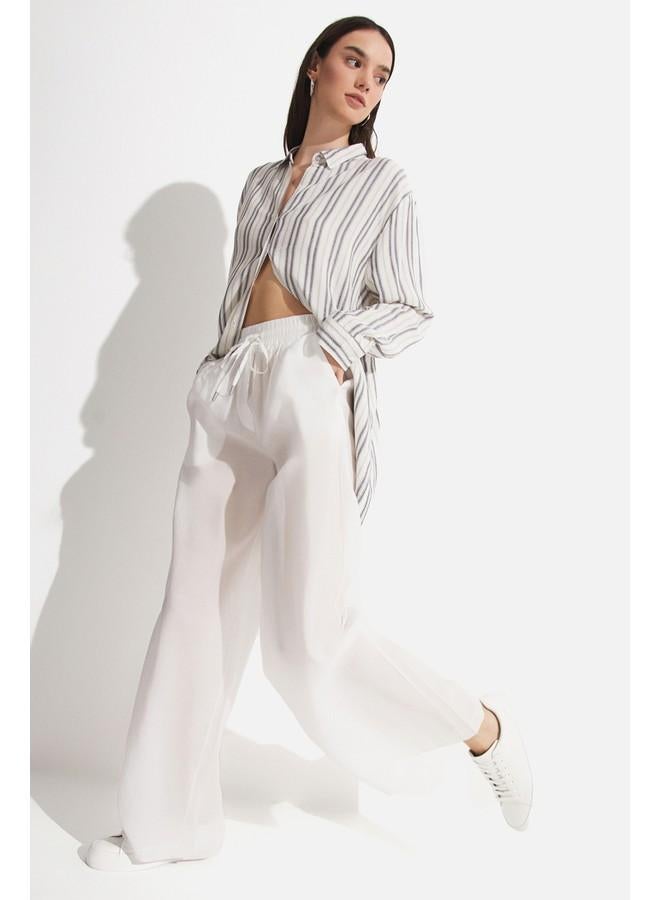 جون بنطلون واسع نسائي من مودال بمقاس مرن بخصر مطاطي بلون إكرو - Image 3