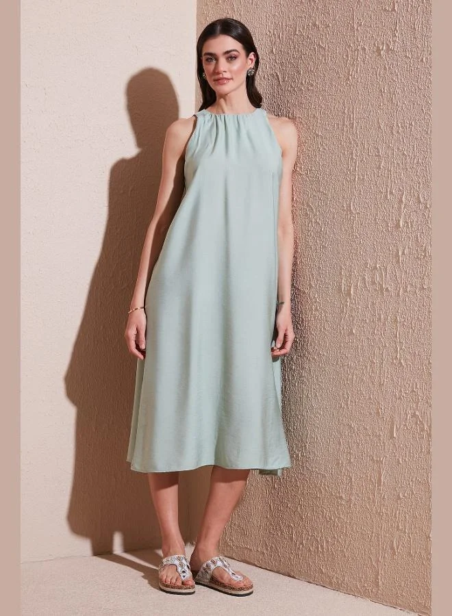 ليلا فستان ليلا متوسط الطول بياقة هالتر بقصة عادية للنساء