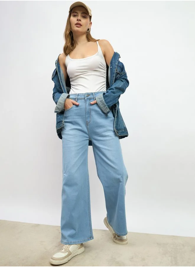 ستايلي Mid Rise Wide Leg Faded Jeans