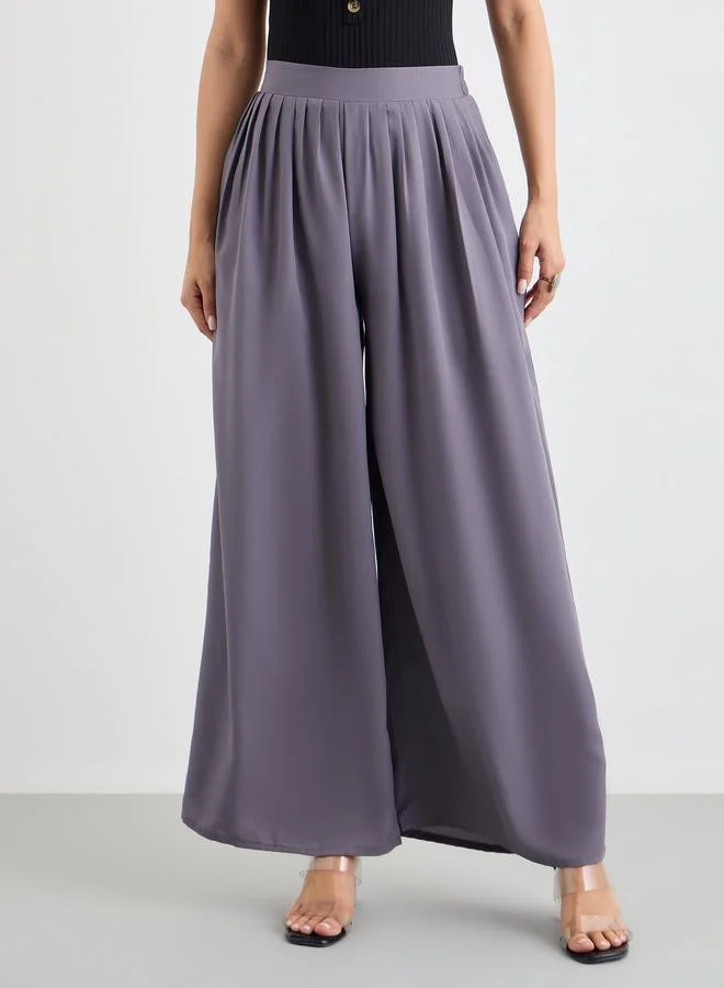 ستايلي بنطال بأرجل واسعة وخصر نصف مطاطي