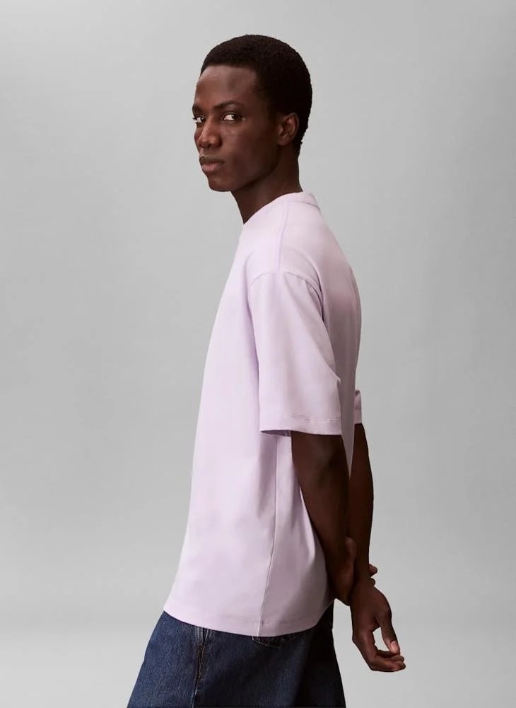 Calvin Klein Jeans  Relaxed Fit Logo Graphic T-Shirt for Men | Best Price UAE