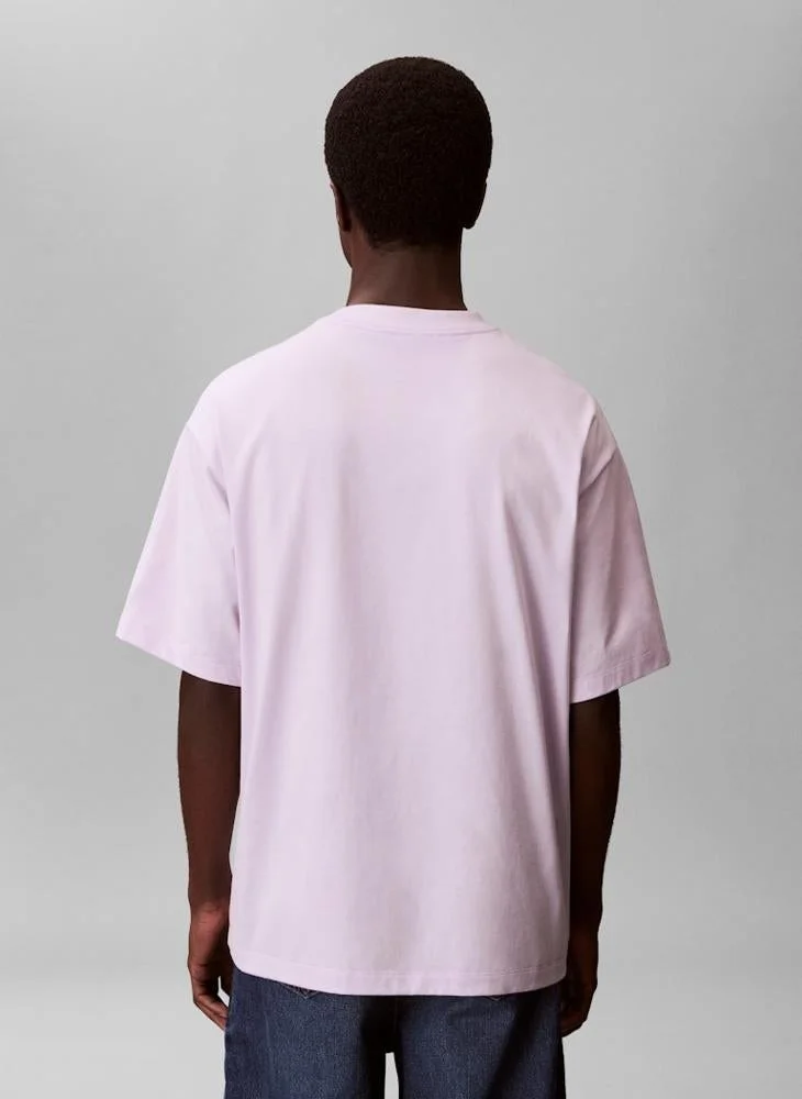 Calvin Klein Jeans  Relaxed Fit Logo Graphic T-Shirt for Men | Best Price UAE