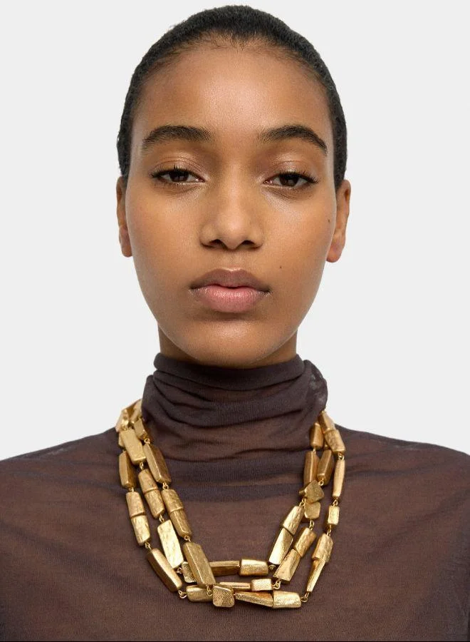 بارفوا ماكسي متعدد الياقات مع خرز بتأثير حجر ذهبي