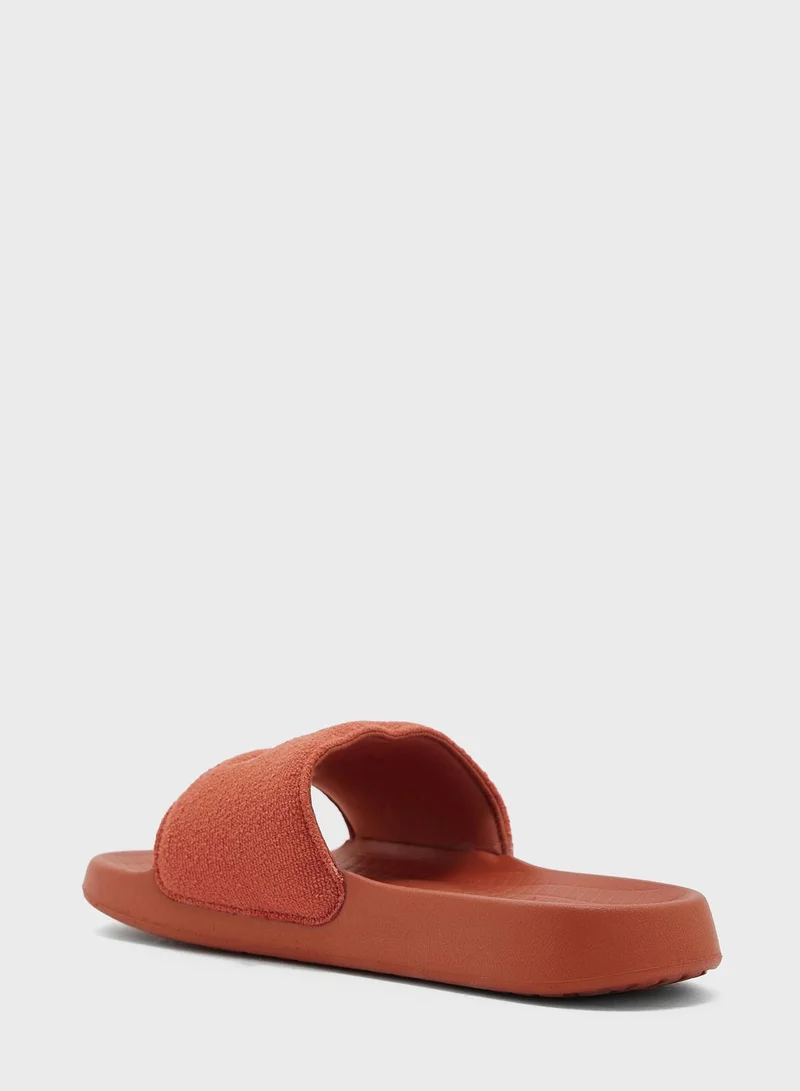 LACOSTE Serve Logo Slides