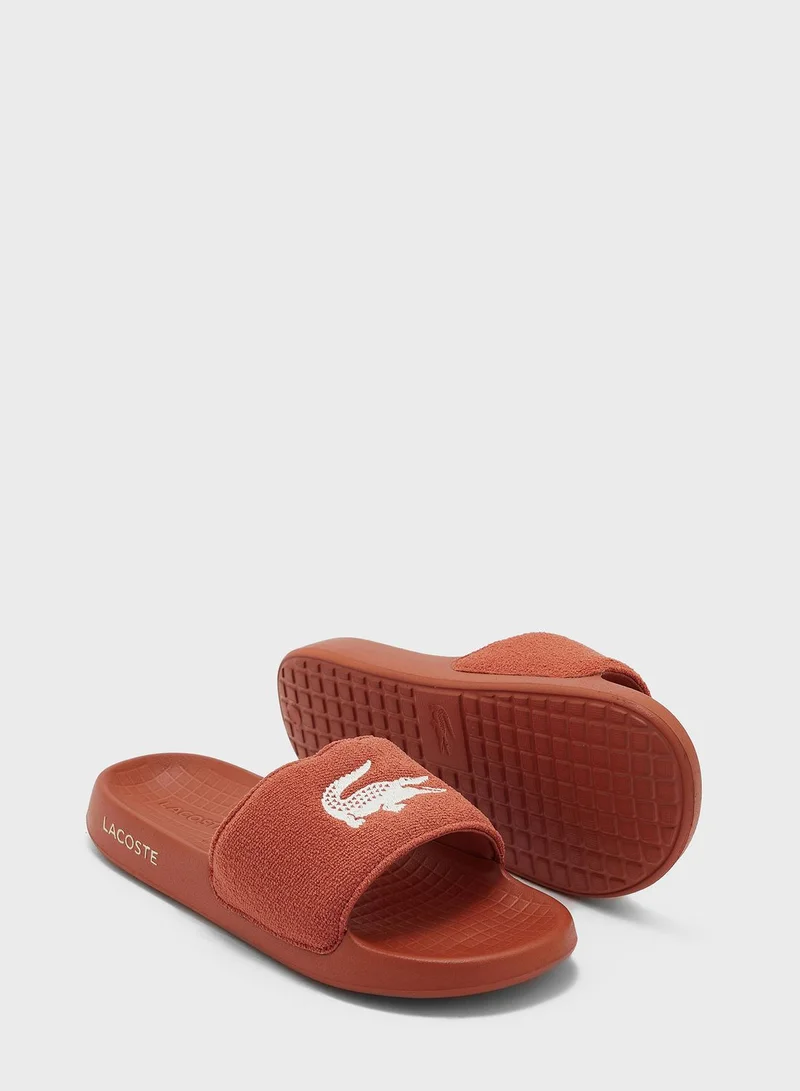 LACOSTE Serve Logo Slides