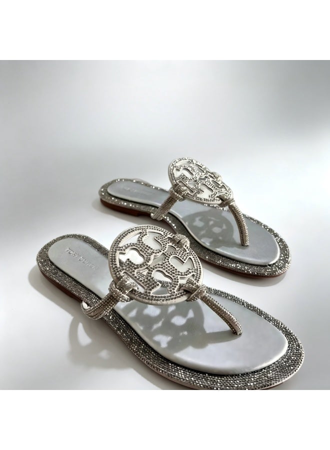 Tory Women's Silver Embellished Flat Thong Sandals with Rhinestone Detail - Image 1