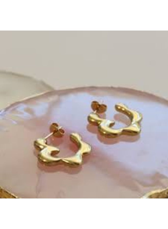Luxuria These gold women's earrings feature a unique, wavy design resembling a melting flower, adding a touch of modern elegance. - Image 5
