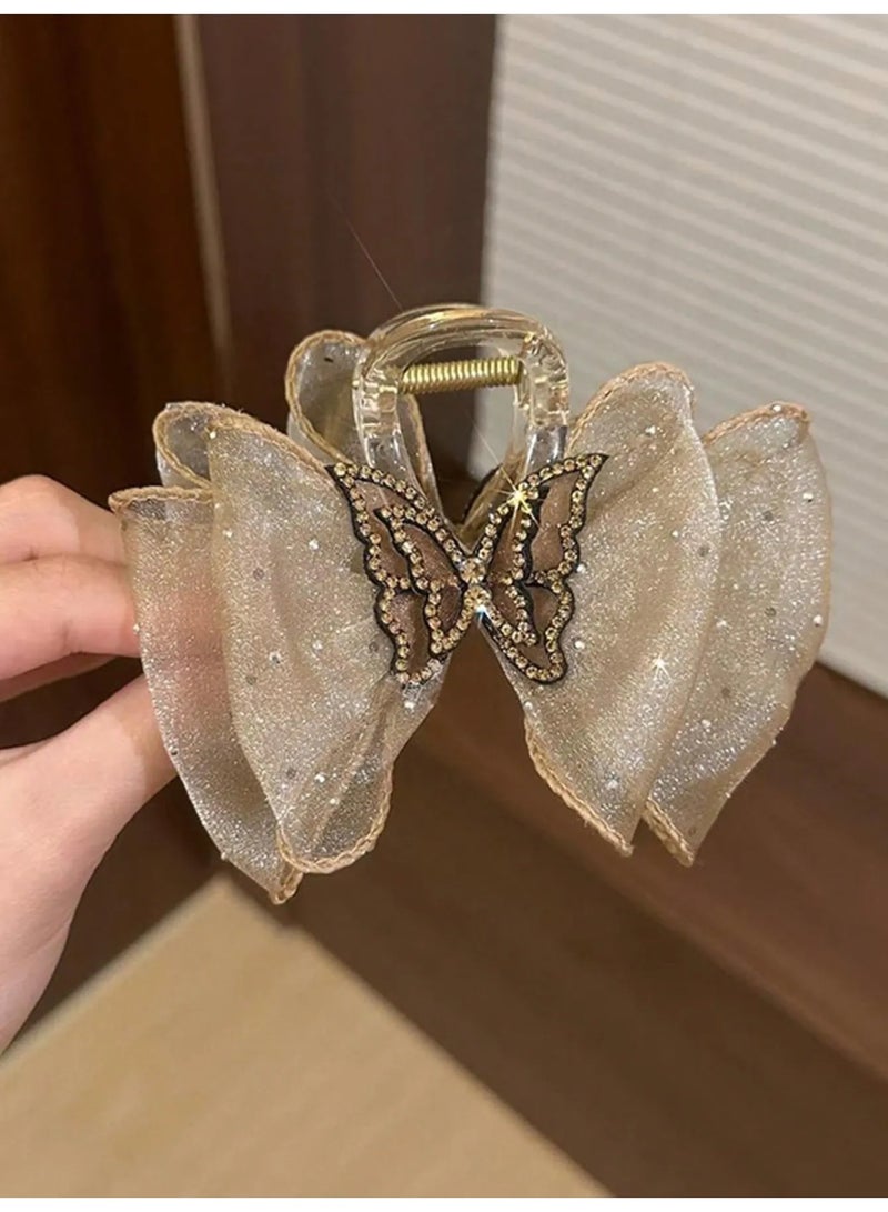 مشبك شعر بتصميم فيونكه مزينه بكريستالات لامعة على شكل فراشه لطيفه  مشبك شعر يضيف لمسة أنثوية وجذابة لتسريحة شعرك - Image 1