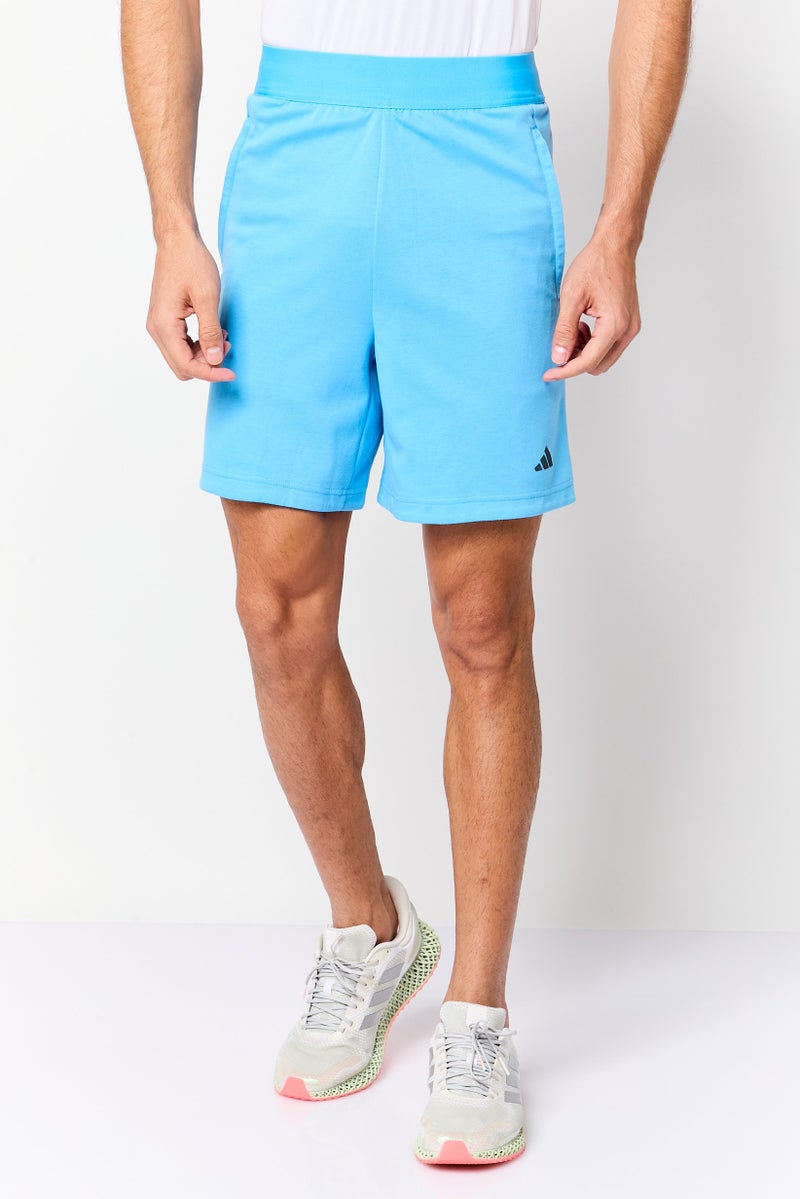 Adidas Men Sportswear Fit Brand Logo 7 Inseam Yoga Shorts, Light Blue - Image 1