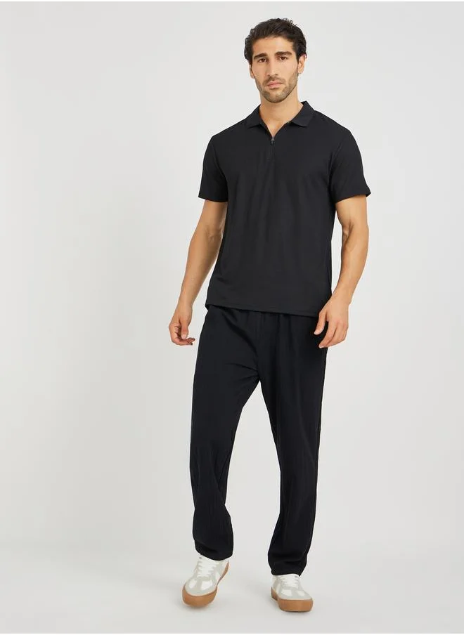 ستايلي Styli Men Black Textured Zip Front Relaxed Fit Polo T-Shirt