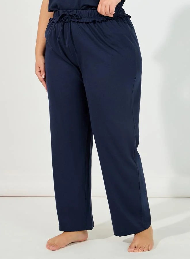 Styli Plus Size Slogan Pocket Print T-Shirt & Ruffle Waistband Pyjama Set