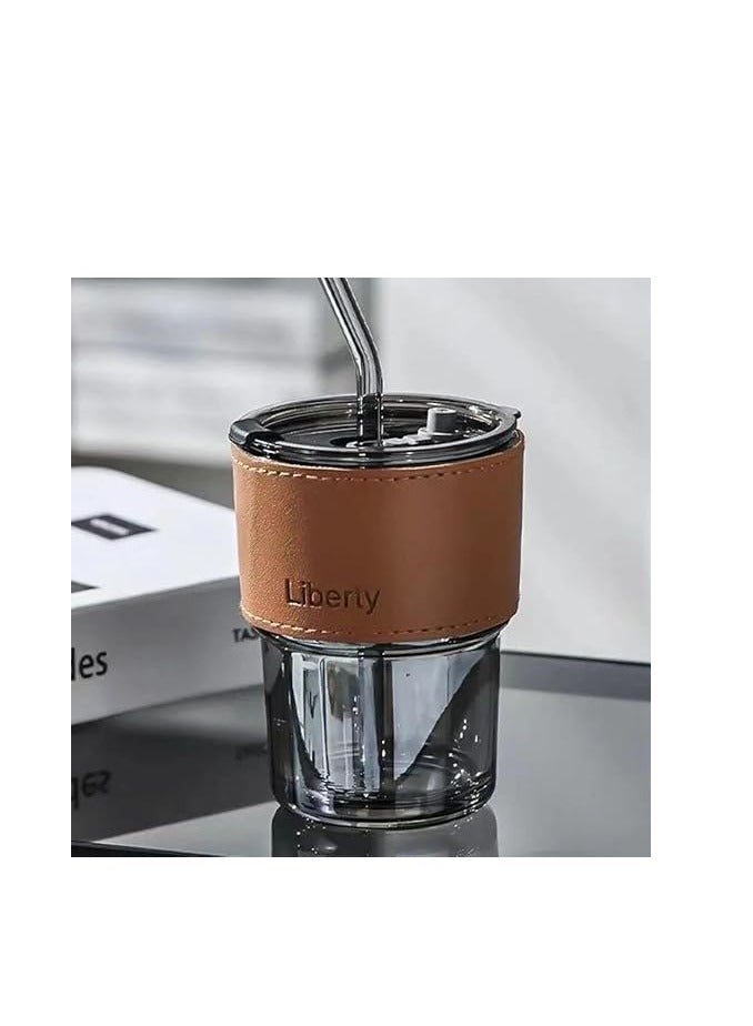 A glass mug with a straw for hot and cold drinks and a straw for hot and cold drinks - Image 1