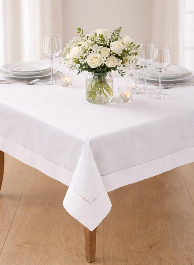 Fennco Styles Classic Solid Color Hemstitch Border Tablecloth for Dining Table, Banquet, Wedding, Family Dinner, 84 x84 Inch, White - Image 1