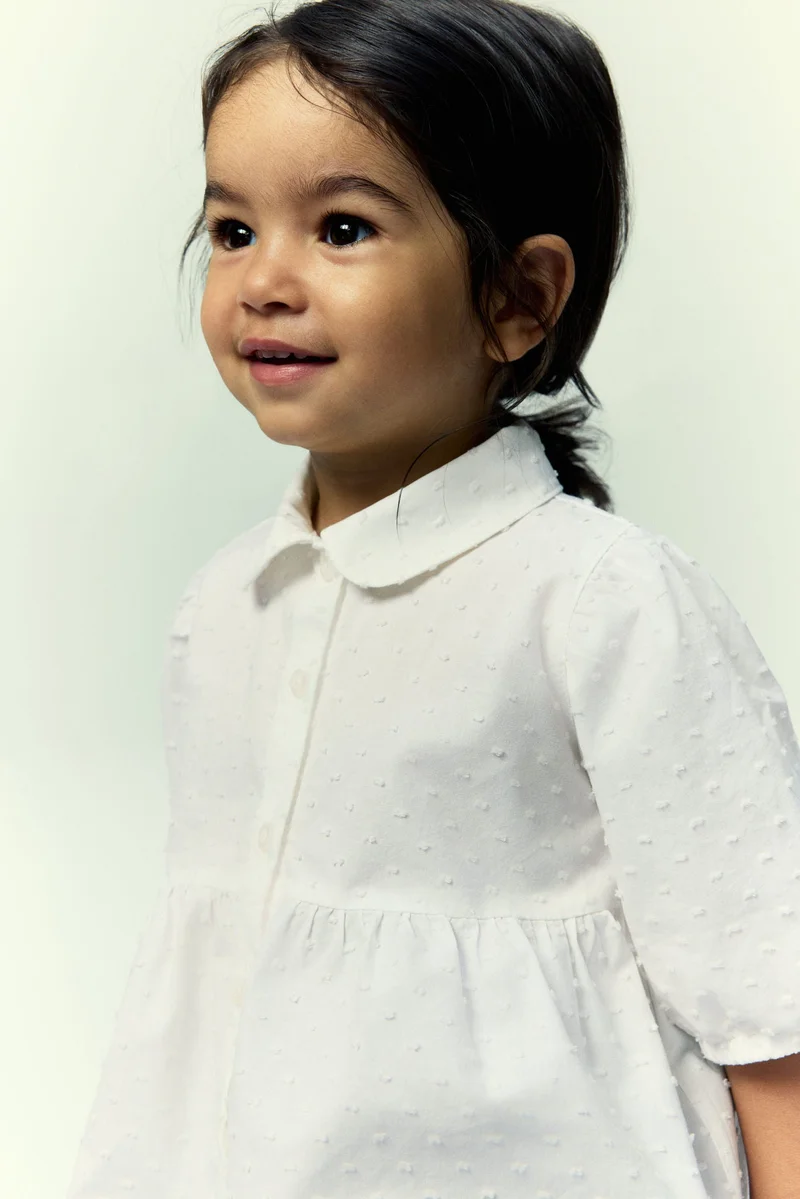 اتش اند ام بلوزة من قطن بلومتي