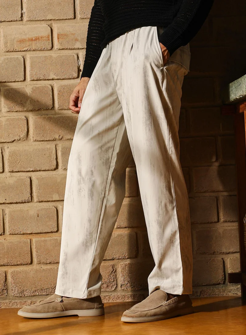 Campus Sutra  Men Gazed-Imprint Relaxed Trousers | Mid-Rise, Elasticated Stretch | Pull On , Straight Hem | Abstract Print Twill | Woven Fabric For Casual & Street Wear | Ivory White for Men | Best Price UAE