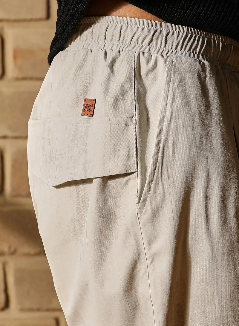 Campus Sutra  Men Gazed-Imprint Relaxed Trousers | Mid-Rise, Elasticated Stretch | Pull On , Straight Hem | Abstract Print Twill | Woven Fabric For Casual & Street Wear | Ivory White for Men | Best Price UAE