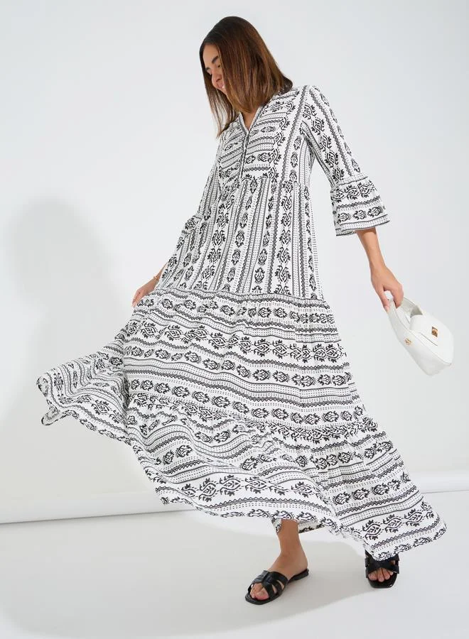 Styli AOP Notch Neck Maxi Dress with Bell Sleeve