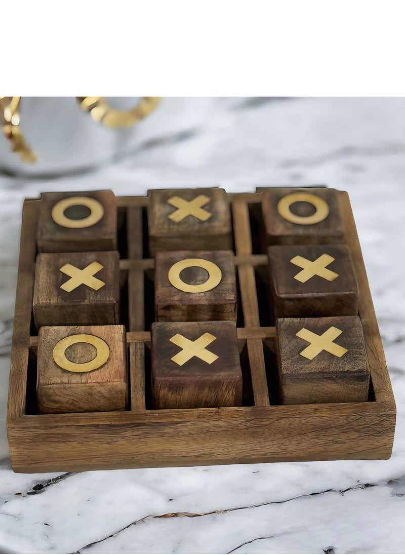 XO board game, handmade, made of wood, divided into squares, with the symbols X and O drawn on them, and characterized by its wooden base, which makes it rest on the table or on the floor.