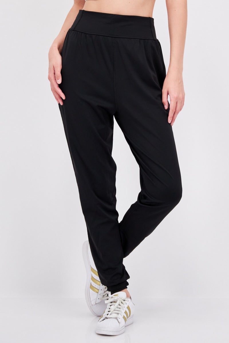 PUMA Women Sportswear Fit Running Track Pant, Black  - Image 1