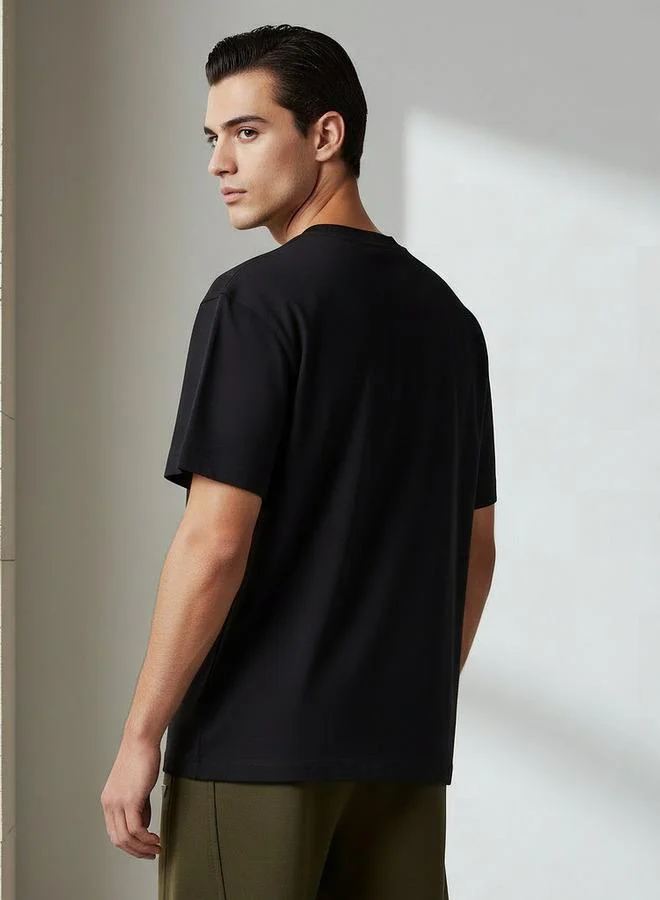Lee Cooper  Lee Cooper Men Regular Fit Crew Neck Short Sleeves Embellished T-shirt for Men | Best Price UAE