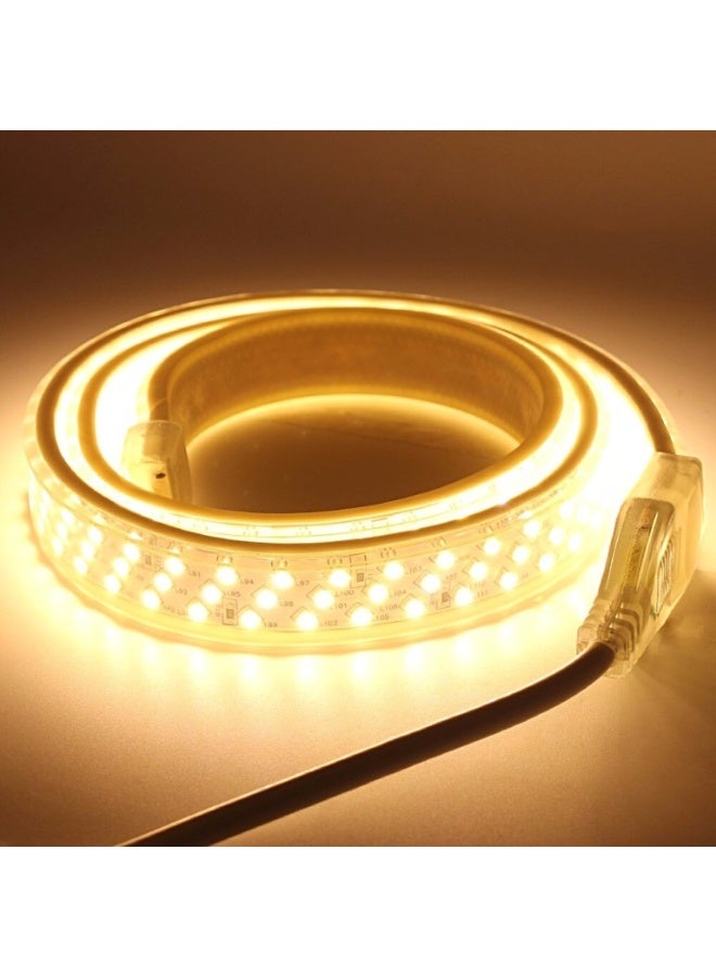 شريط إضاءة LED مرن بطول 5 أمتار، ثلاثي الخطوط، SMD 2835 180D (3x60)، بقدرة 15 واط/متر (يقطع بطول 20 سم)، إضاءة ديكورية عالية السطوع، لون أبيض دافئ 3000 كلفن، يعمل بجهد 220 فولت تيار متردد، مقاوم للماء بمعيار IP65، مزود بموصل كهربائي - Image 1