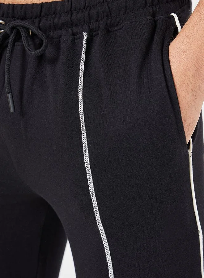 Styli Slim Fit Pintuck Open Hem Side Slit Jogger