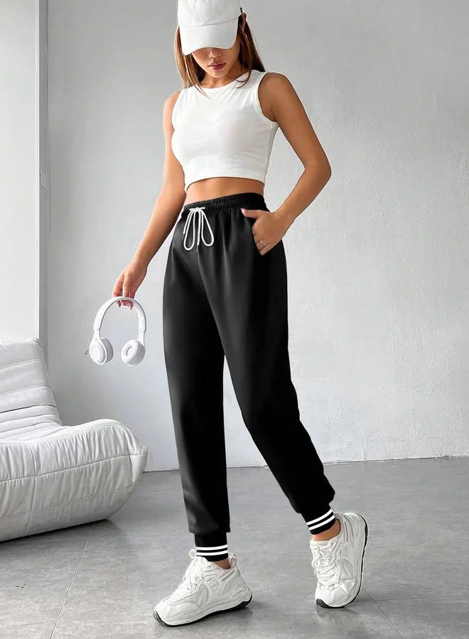 تايك تو بنطلون رياضي أسود سادة بأساور