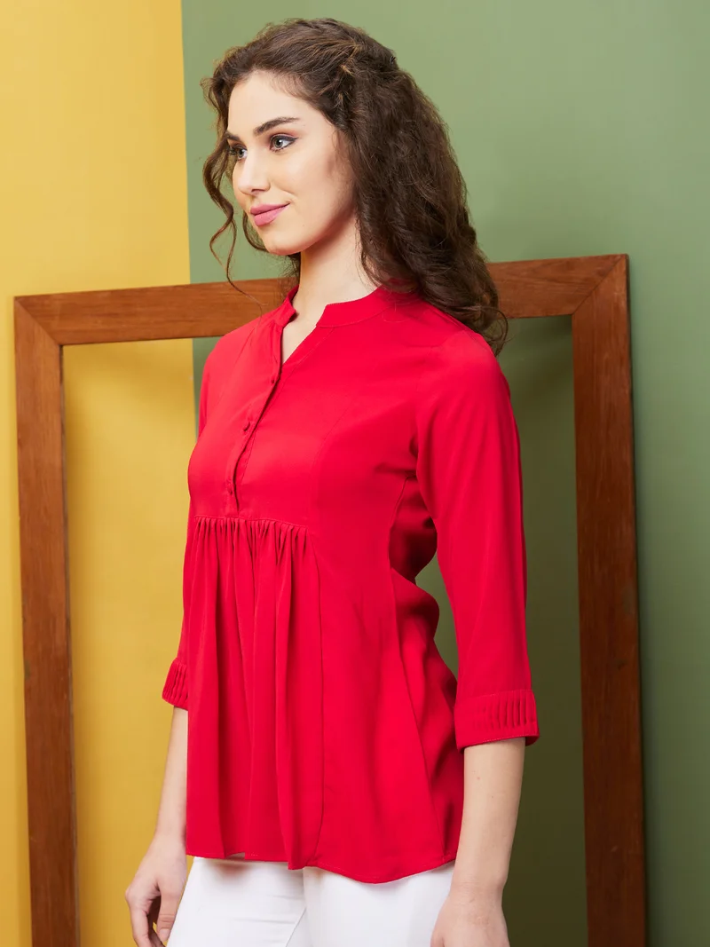 جلو باص بلوزة نسائية طويلة بياقة ماندرين شفافة باللون الوردي