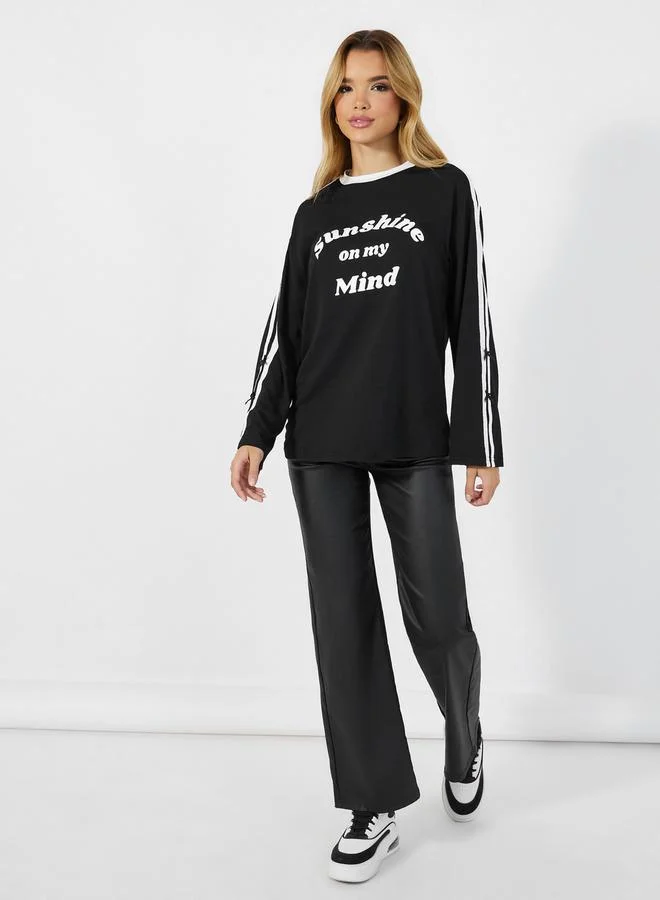 Styli Oversized Slogan Print T-Shirt with Bow Detail
