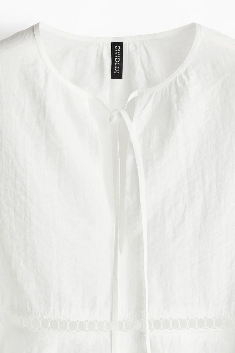 H&M Oversized lace-inset blouse