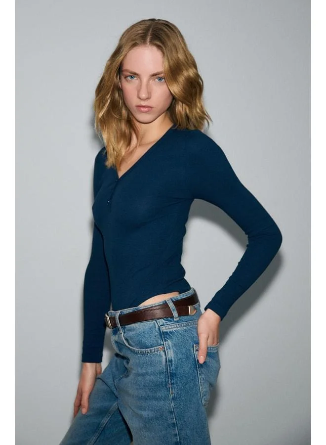 Grimelange KALANI Women's Long Sleeve Snap V-Neck Covered-Button Navy Blouse.