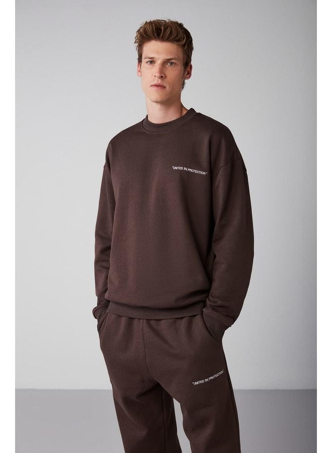 GRIMELANGE Raırok Men's Fleece-Lined Comfort Oversize Embroidered Brown Sweatshirt. - Image 1