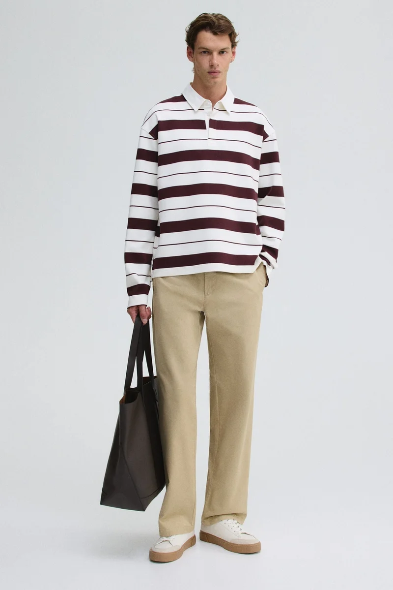 اتش اند ام تي-شيرت رغبي بقصّة واسعة