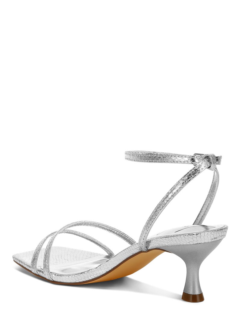 Faux Leather Strappy Sandals in Silver - pzsku/Z6676E60C62D791F3458BZ/45/_/1740376564/c50f5b21-2ffb-49f4-a37e-1633b5c104a9