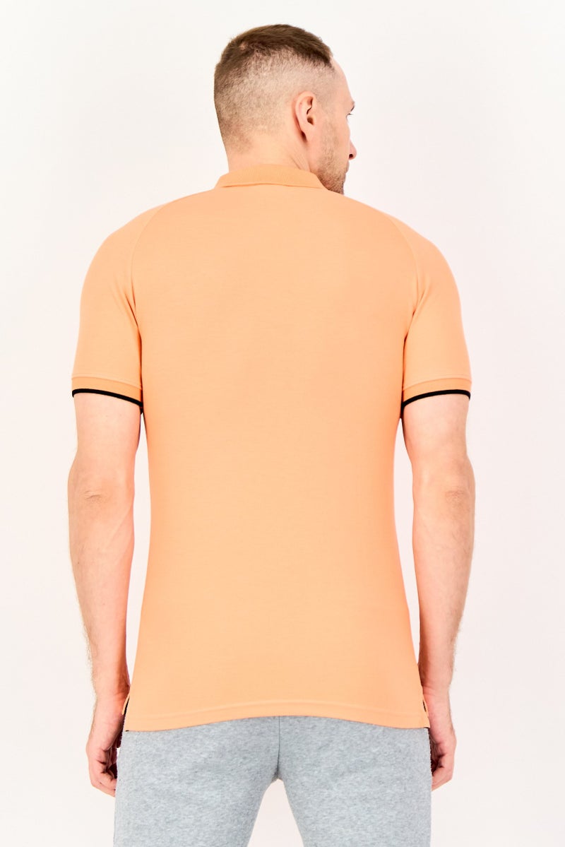 PUMA Men Slim Fit Short Sleeve Embroidered Logo Outdoor Polo Shirt, Coral - Image 3