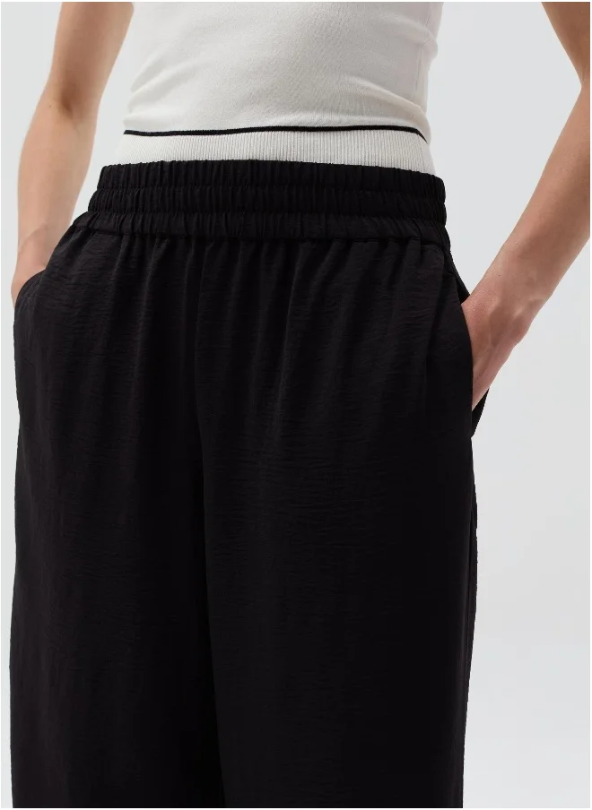 او في اس Crinkle-effect fluid trousers