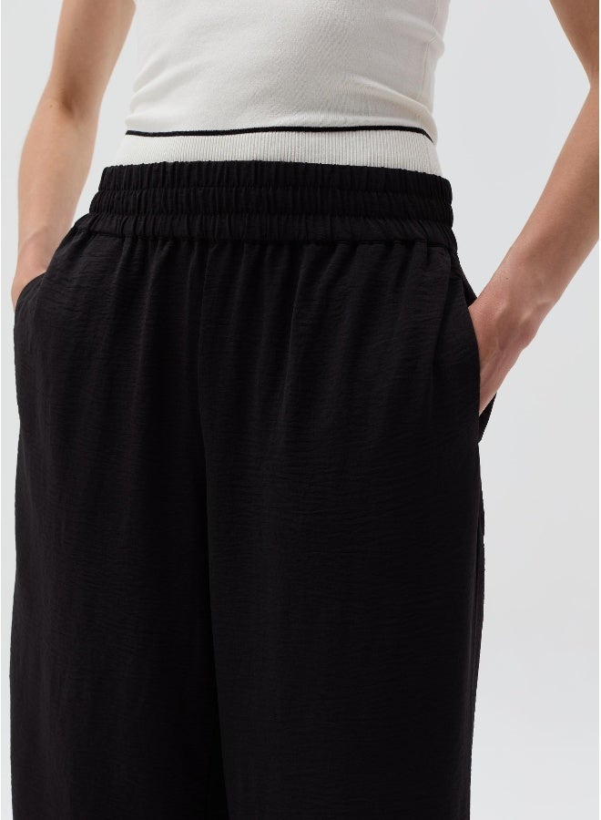 او في اس Crinkle-effect fluid trousers - Image 4