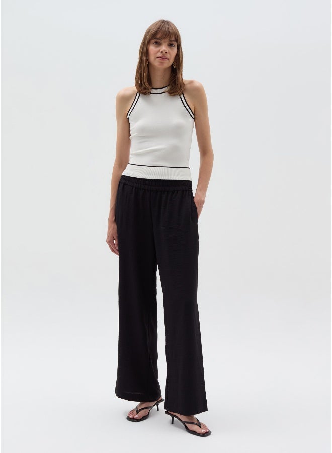 او في اس Crinkle-effect fluid trousers - Image 1