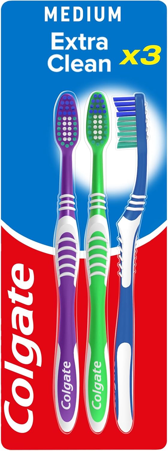 Colgate Extra Clean Medium Manual Toothbrush Assorted with a Cleaning Tip That Reaches and Cleans Back Teeth Pack of 3