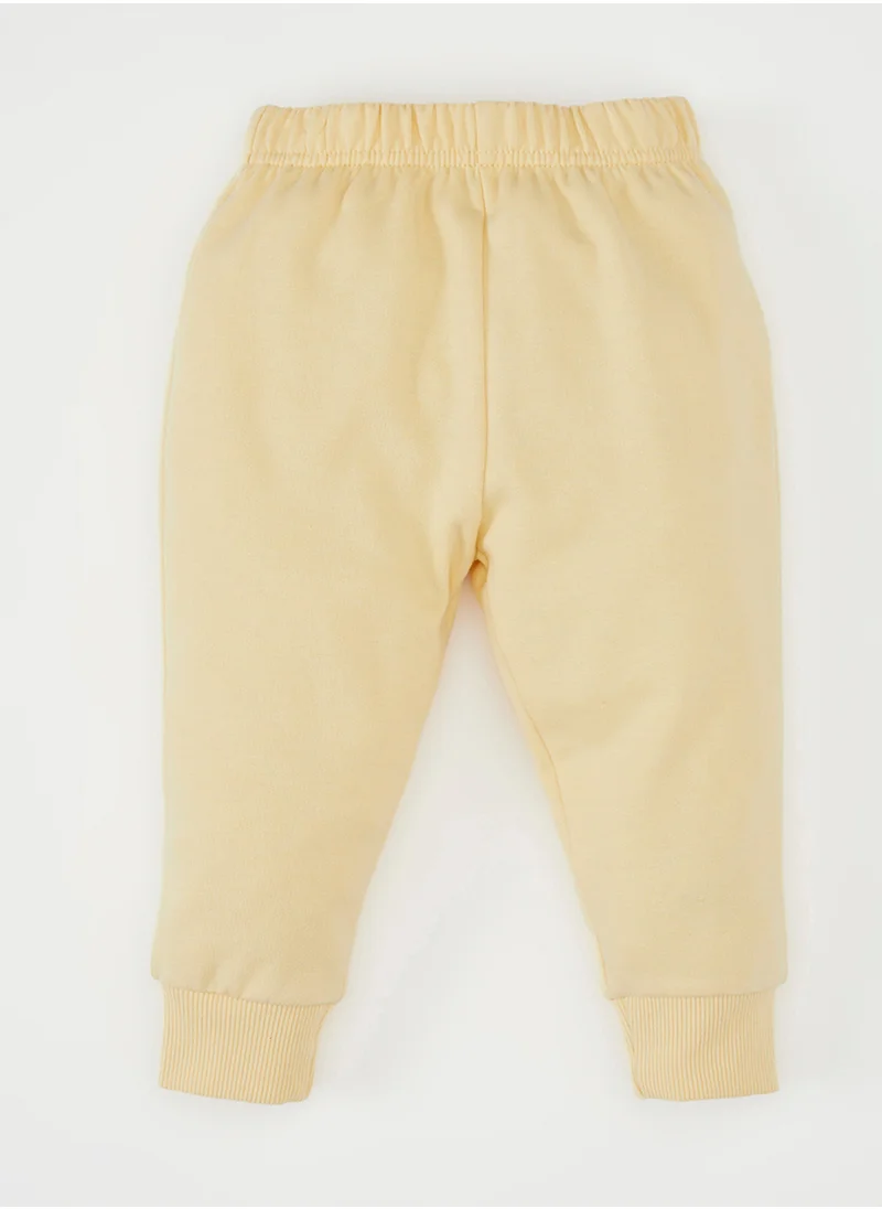 ديفاكتو Printed Crew Neck Sweatshirt With Elastic Waist Jogger Pants 2-Piece Set