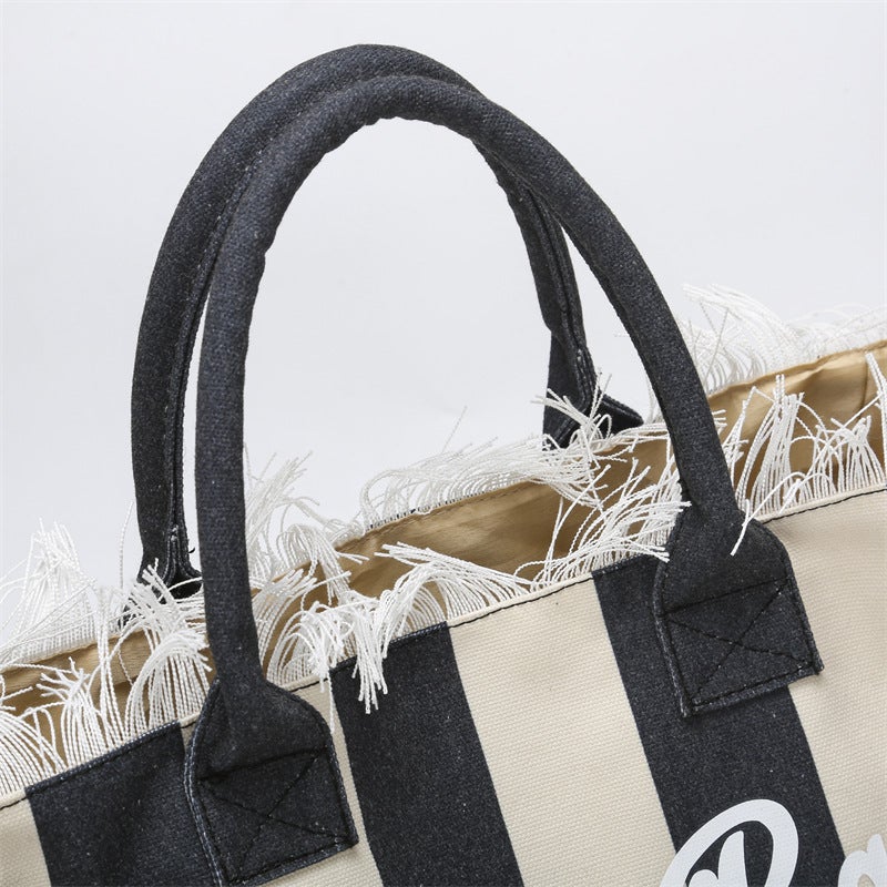 New Women'S Bag Fashion Striped Large Capacity Shoulder Bag Portable Large Bag Tassel Canvas Letters Tote Bag - Image 4