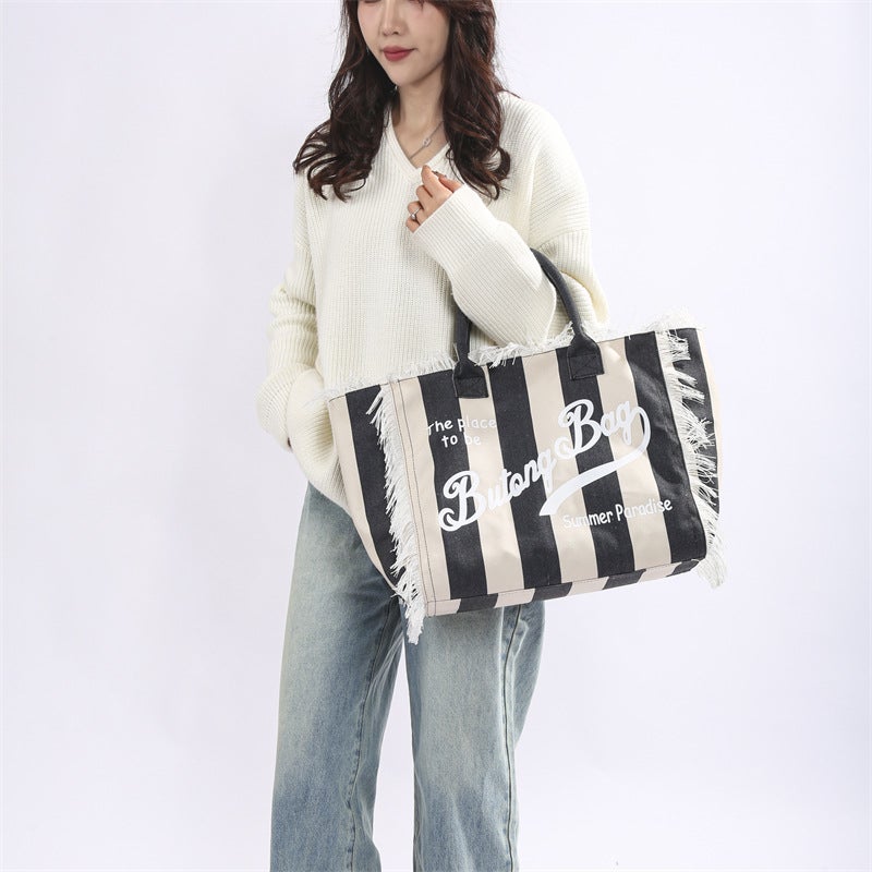 New Women'S Bag Fashion Striped Large Capacity Shoulder Bag Portable Large Bag Tassel Canvas Letters Tote Bag - Image 2