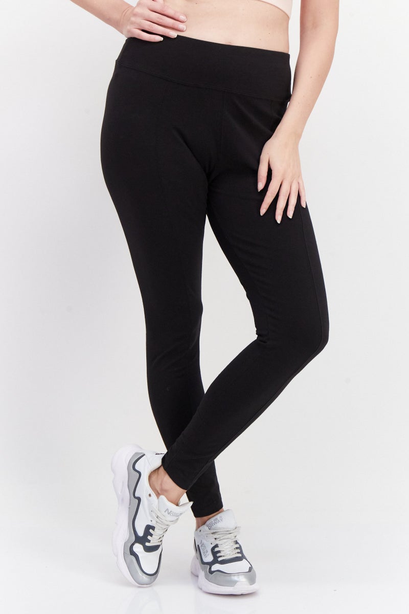 PUMA سراويل رياضية نسائية ضيقة بخصر مرتفع للتدريب، سوداء - Image 1