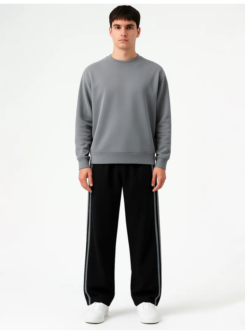 Maniac  Maniac Mens Color Block Black and Light Grey Cotton Baggy Trackpant for Men | Best Price UAE