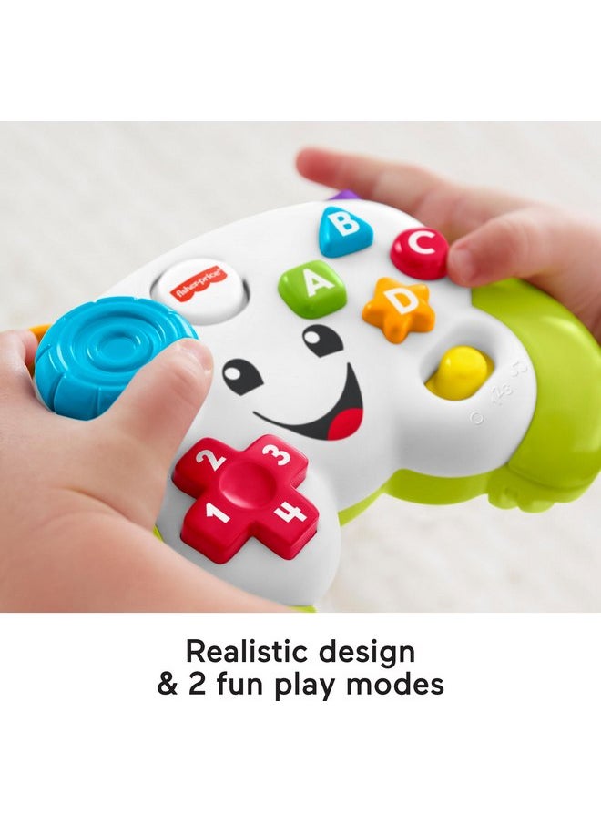 فيشر برايس لعبة Fisher-Price Baby & Toddler Toy Laugh & Learn Game & Learn Controller باللون الأخضر لعبة فيديو تظاهرية مع موسيقى وأضواء للأطفال الرضع من سن 6 أشهر فما فوق  - Image 3