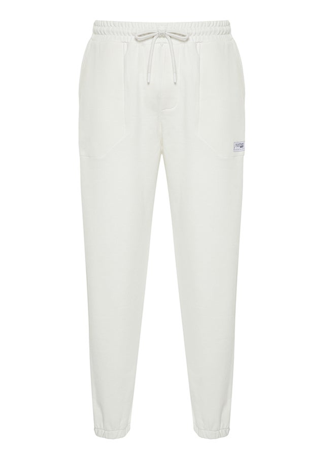 trendyol - Ecru Regular Fit Label Appliqued Pockets Stitched Sweatpants TMNSS23EA00010 - Image 1